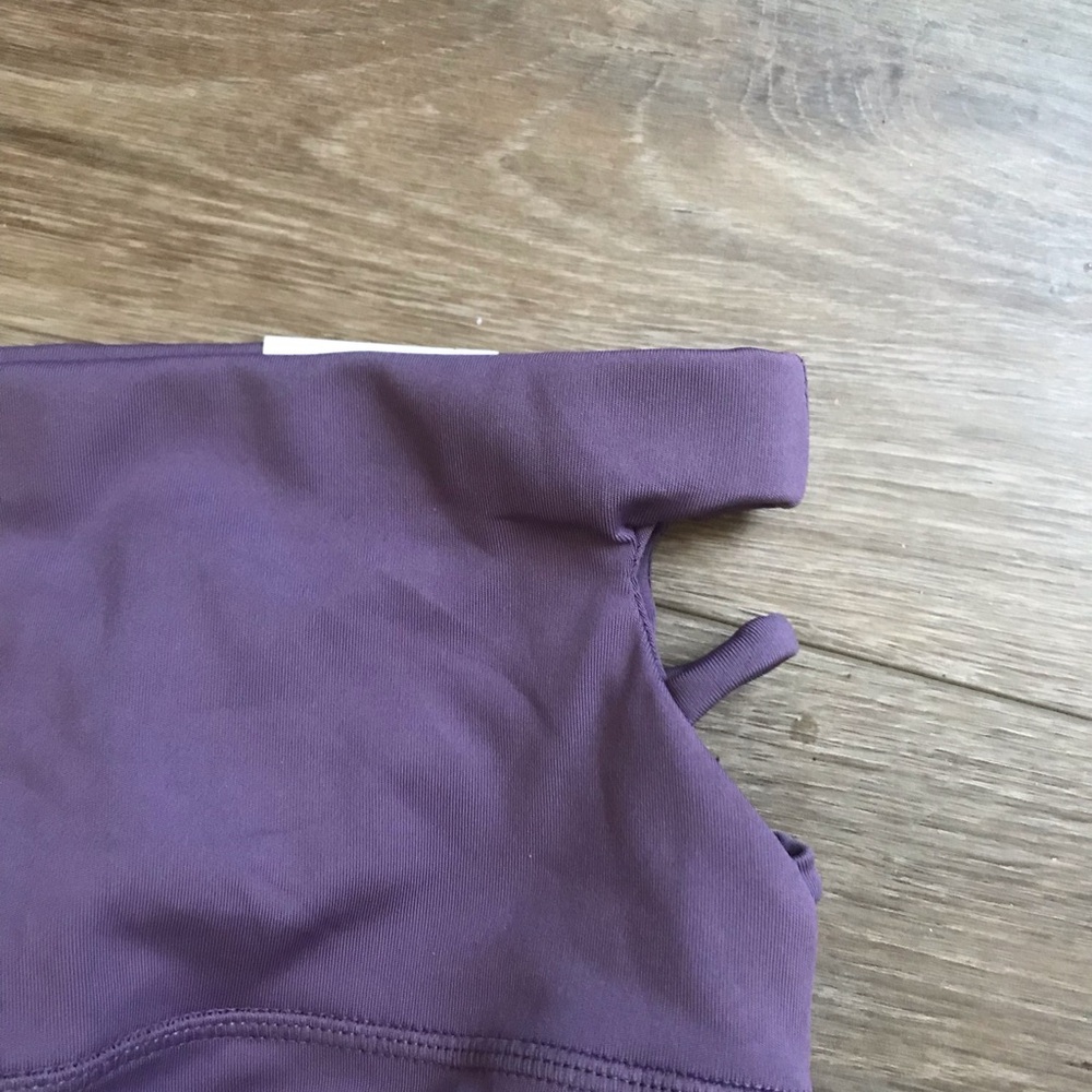 Otos Active Wear yoga pants. Flare leg at bottom. Sides are cut out.💜 - Picture 3 of 4